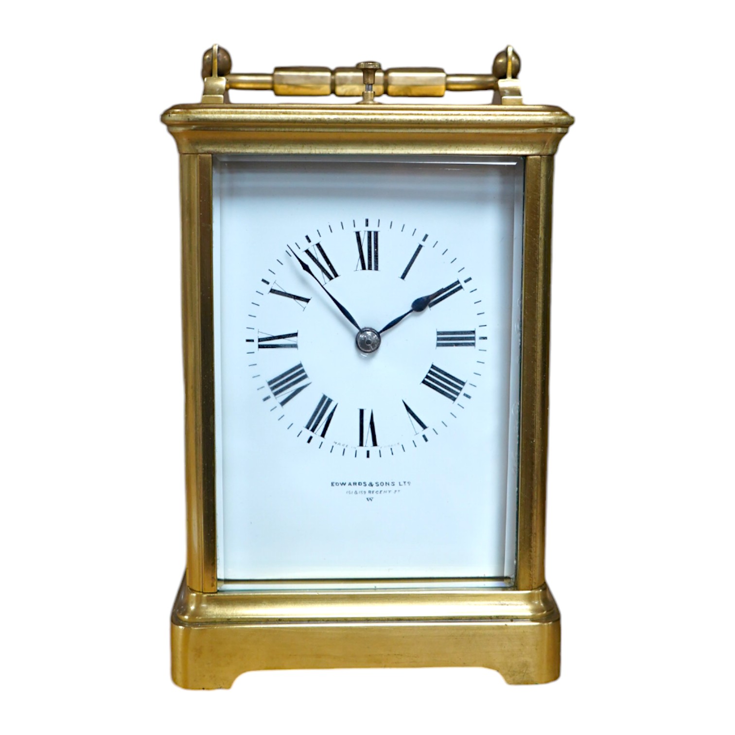 A brass cased repeating carriage clock, retailed by Edwards & Sons Ltd., no key, 15cm. Condition - fair to good, not tested